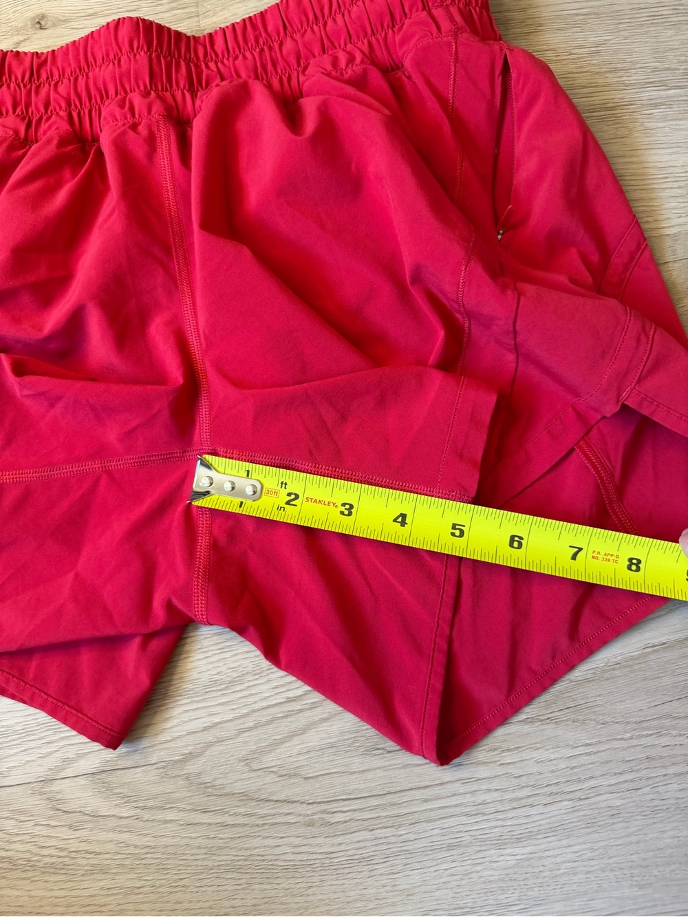 Bright red lululemon high rise track that shorts - Picture 4 of 4